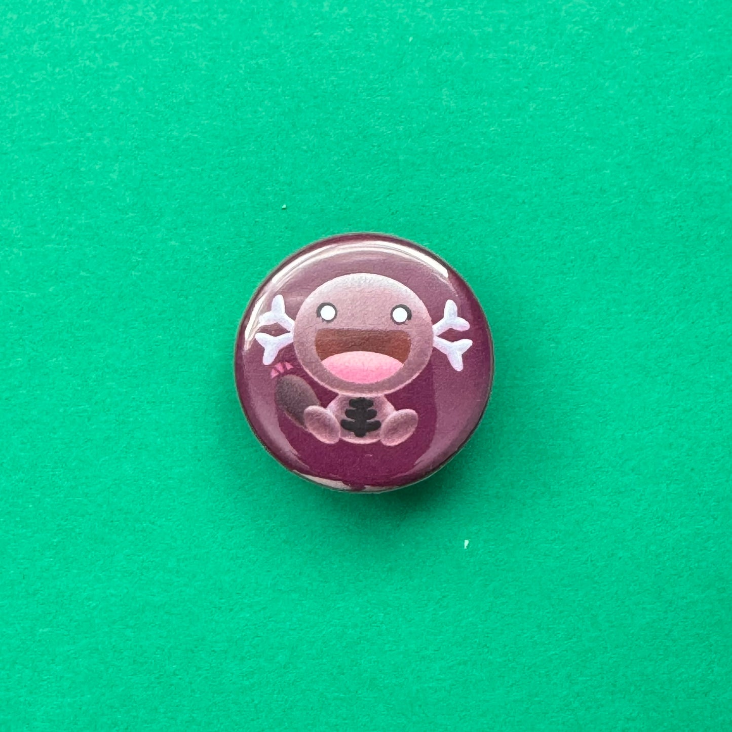 Grounded Fish Button Pin